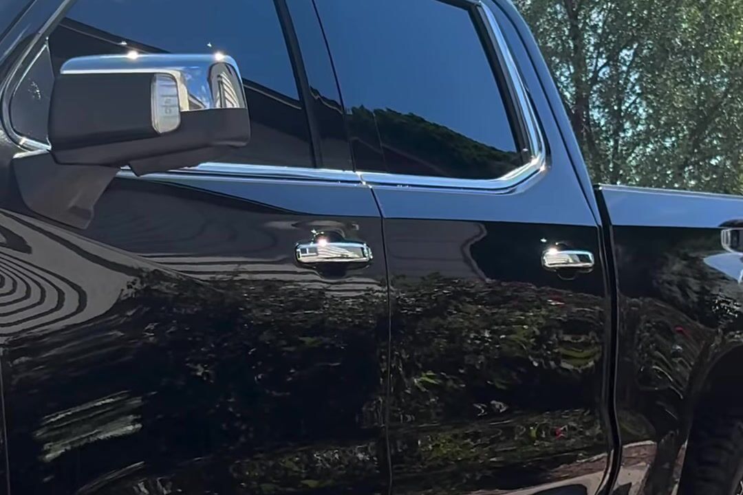 Same black Silverado rinsed and gleaming