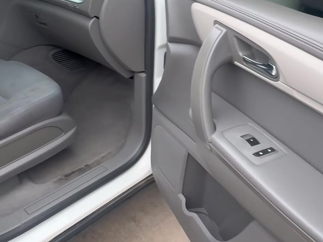 Chevy Traverse front seat and door panel, clean after an interior detail